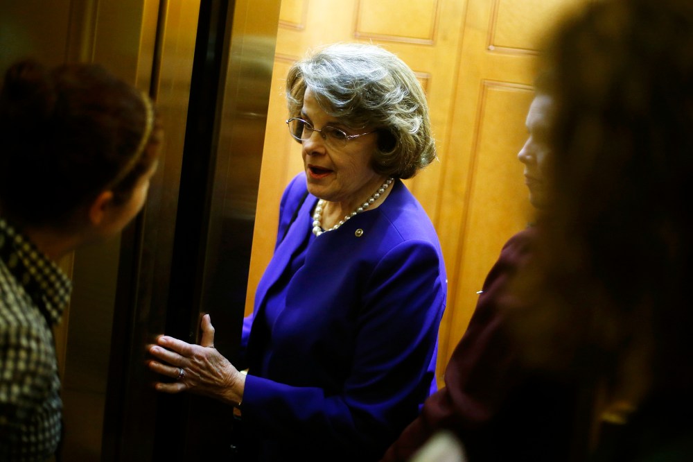U.S. Senator Dianne Feinstein (D-Calif.) talks to a reporter as she departs following the weekly Democratic caucus policy luncheon at the U.S. Capitol in Washington, D.C., June 24, 2014.