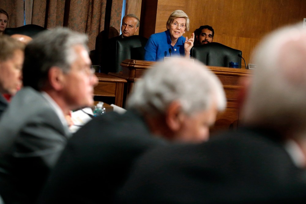 U.S. Senator Warren questions federal financial regulators about Wall Street reform before a Senate Banking Committee hearing on Capitol Hill in Washington