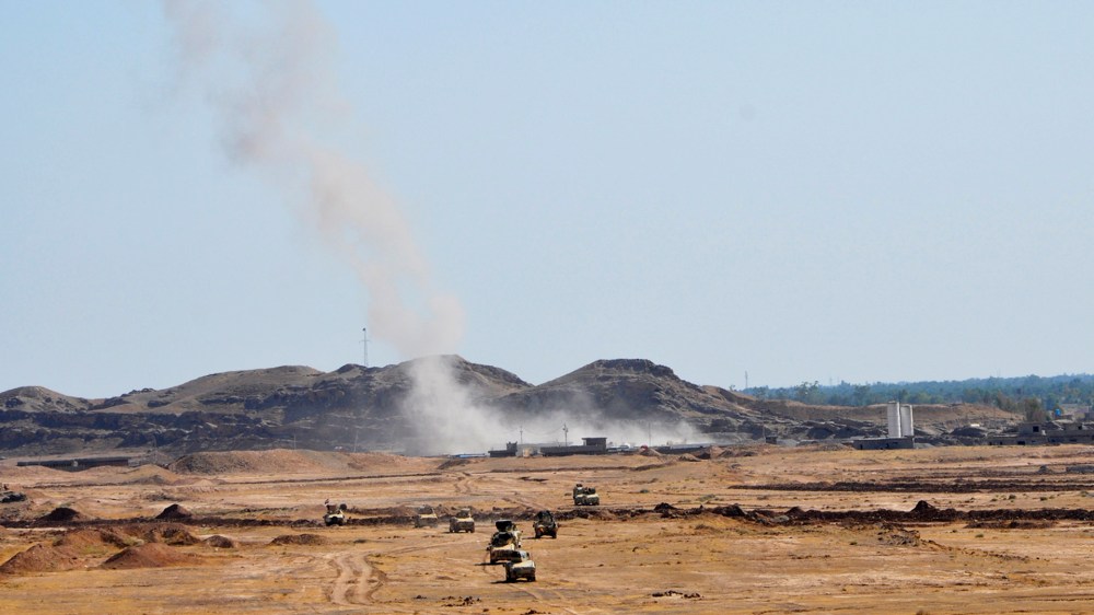 Smoke rises during clashes between Iraqi security forces and Islamic State militants, in Diyala province north of Baghdad October 4, 2014. Picture taken October 4, 2014.