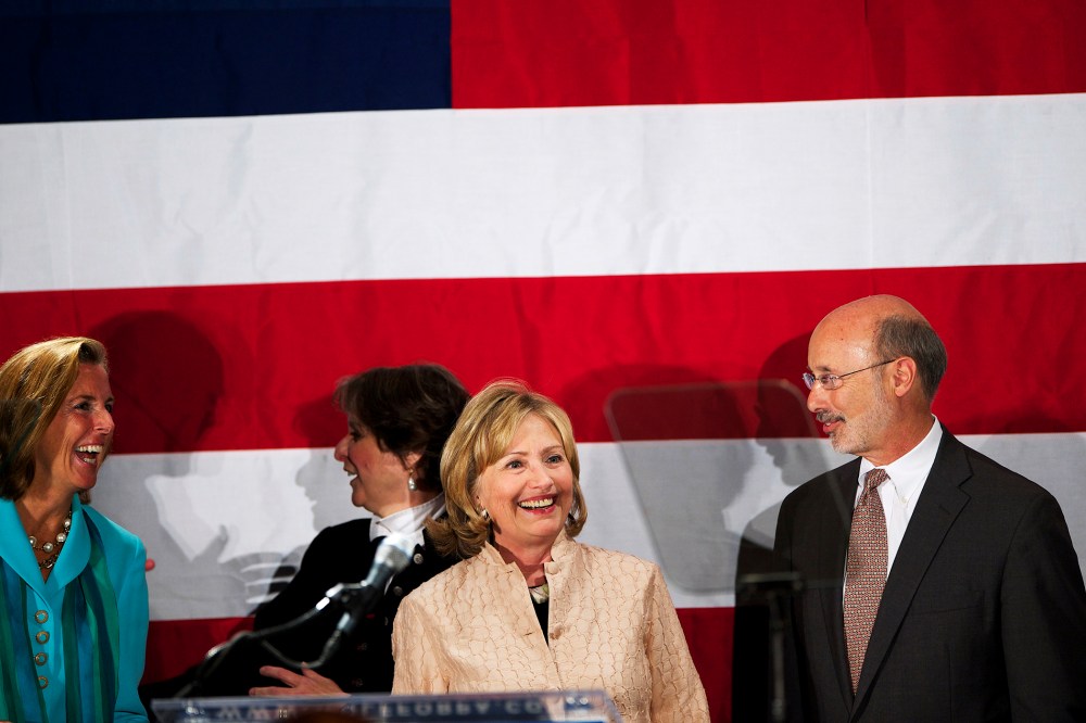 Hillary Clinton join Democratic challenger for Pennsylvania Governor Tom Wolf on stage at the National Constitution Center in Philadelphia, Penn. on Oct. 9, 2014.