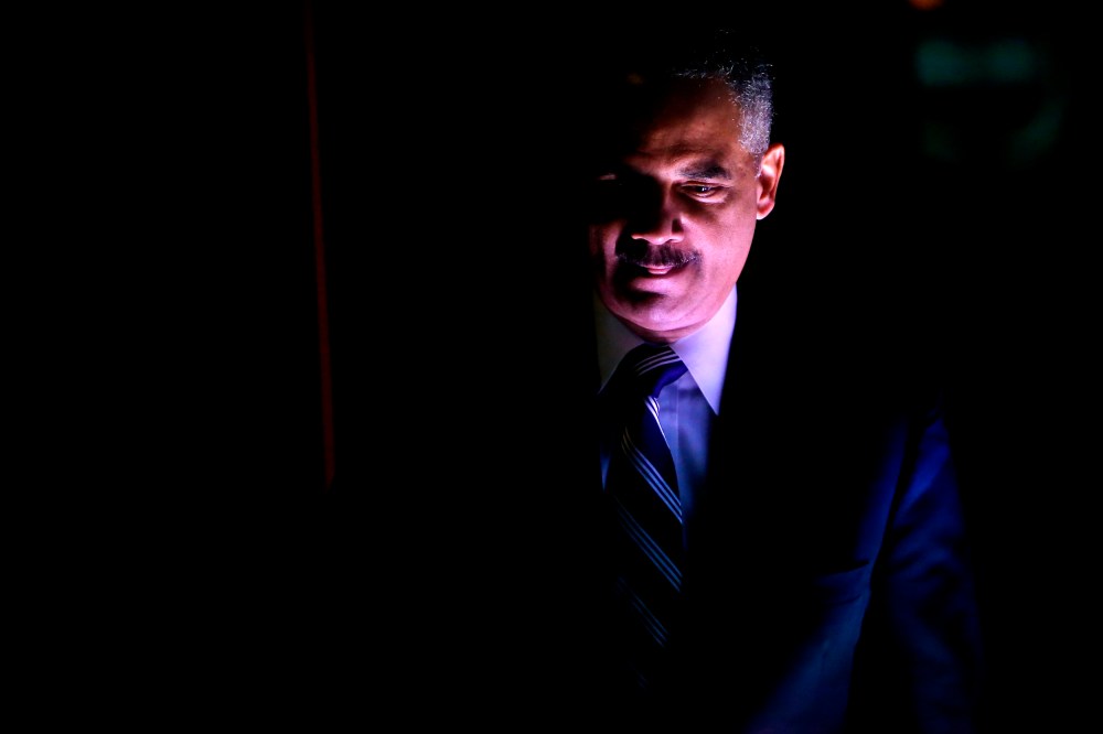 US Attorney General Eric Holder takes the stage to participate in the Washington Ideas Forum, in Washington October 29, 2014. (Photo by Jonathan Ernst/Reuters)