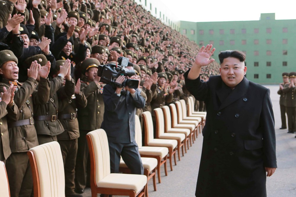 North Korea's leader Kim Jong Un attends a photo session with the participants of a meeting of Korean People's Army (KPA) in this undated photo released by North Korea's Korean Central News Agency (KCNA) in Pyongyang on Nov. 5, 2014. (KCNA KCNA/Reuters)
