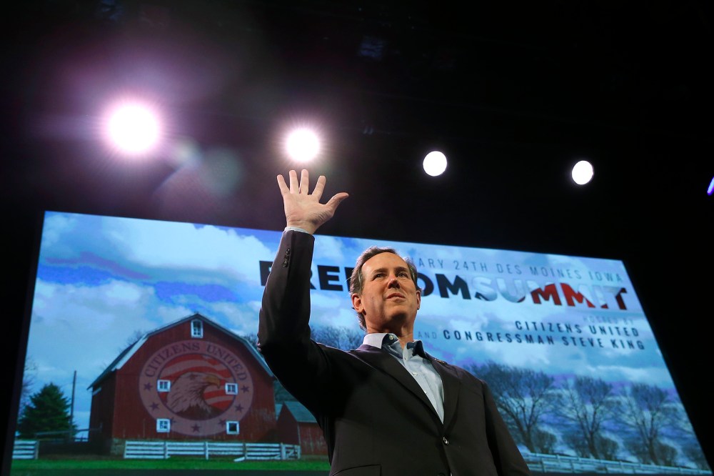 Former U.S. Senator Rick Santorum (R-PA) waves after speaking at the Freedom Summit in Des Moines, Iowa, January 24, 2015. (Photo by Jim Young/Reuters)