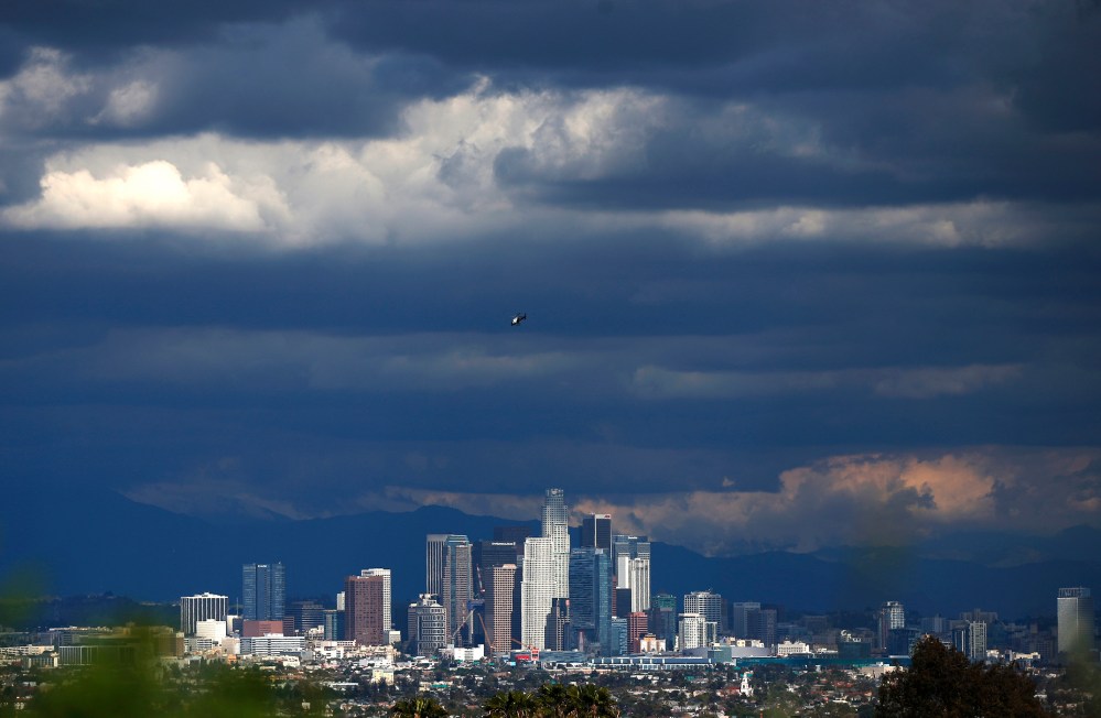 Rain clouds move in over downtown Los Angeles, Calif., March 2, 2015. (Photo by Lucy Nicholson/Reuters)
