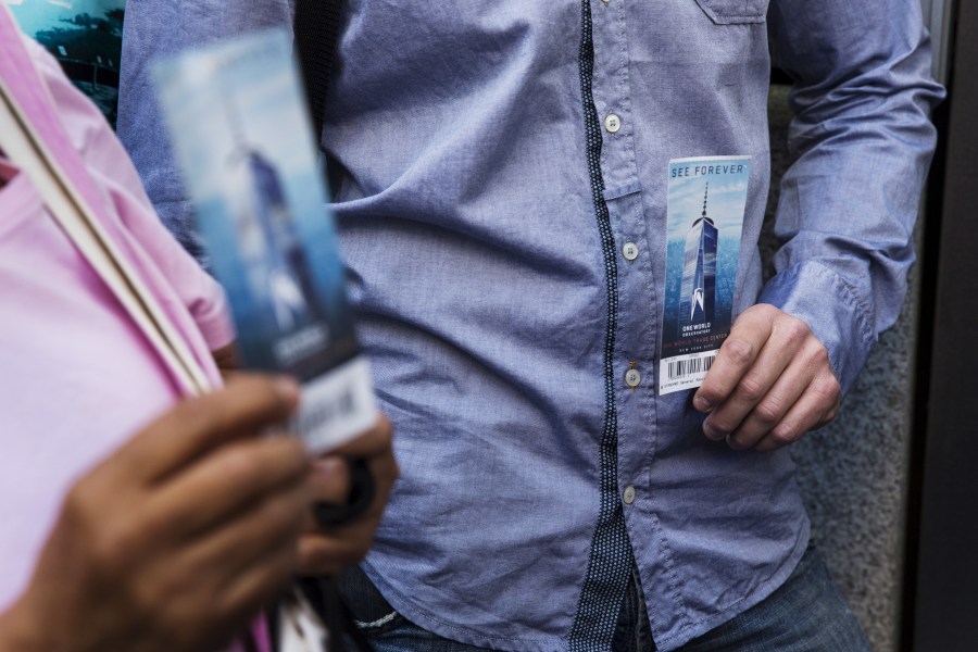 Visitors stand in line holding tickets for the public opening of the One World Observatory in N.Y. on May 29, 2015. (Photo by Lucas Jackson/Reuters)