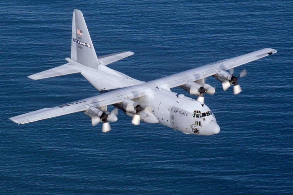 The U.S. Air Force on Dec. 14, 2004 said it has begun flying C-130s to transport cargo above the most dangerous routes in Iraq to ease pressure on truck convoys increasingly targeted by insurgents. (Photo by Sgt. Howard Blair/Reuters)