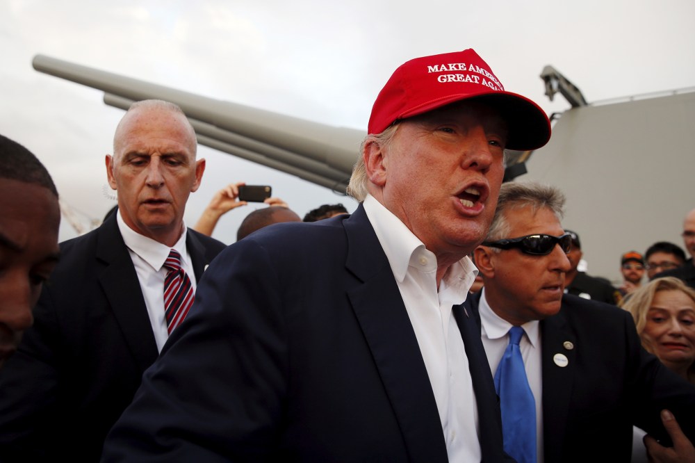 U.S. Republican presidential candidate Donald Trump walks past the guns of the USS Iowa after speaking on the battleship in San Pedro, Los Angeles, Calif., United States Sept. 15, 2015. (Photo by Lucy Nicholson/Reuters)