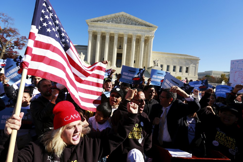 Immigrants and community leaders rally in front of the U.S. Supreme Court to mark the one-year anniversary of President Barack Obama's executive orders on immigration in Washington, Nov. 20, 2015. (Photo by Kevin Lamarque/Reuters)