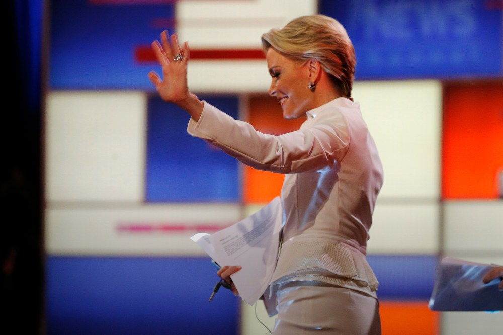 Fox News Channel anchor and debate moderator Megyn Kelly waves to the crowd as she arrives at the Republican presidential candidates debate in Detroit, Mich., March 3, 2016. (Photo by Jim Young/Reuters)