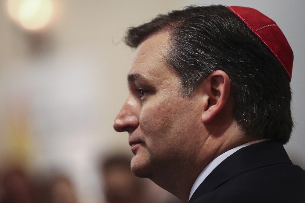 U.S. Republican presidential candidate Ted Cruz wears a yarmulke as he speaks to Jewish community leaders at a campaign event in the Brooklyn borough of New York, April 7, 2016. (Photo by Carlo Allegri/Reuters)