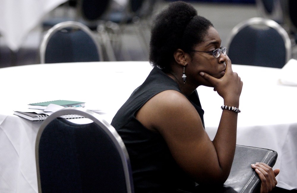 U.S. Air Force veteran Brittany Scott waits to talk to corporate recruiters at a job fair targeting unemployed military veterans in Washington, on June 11, 2013.