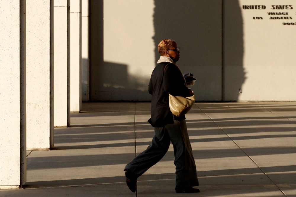 An employee arrives at the Federal Building in Los Angeles