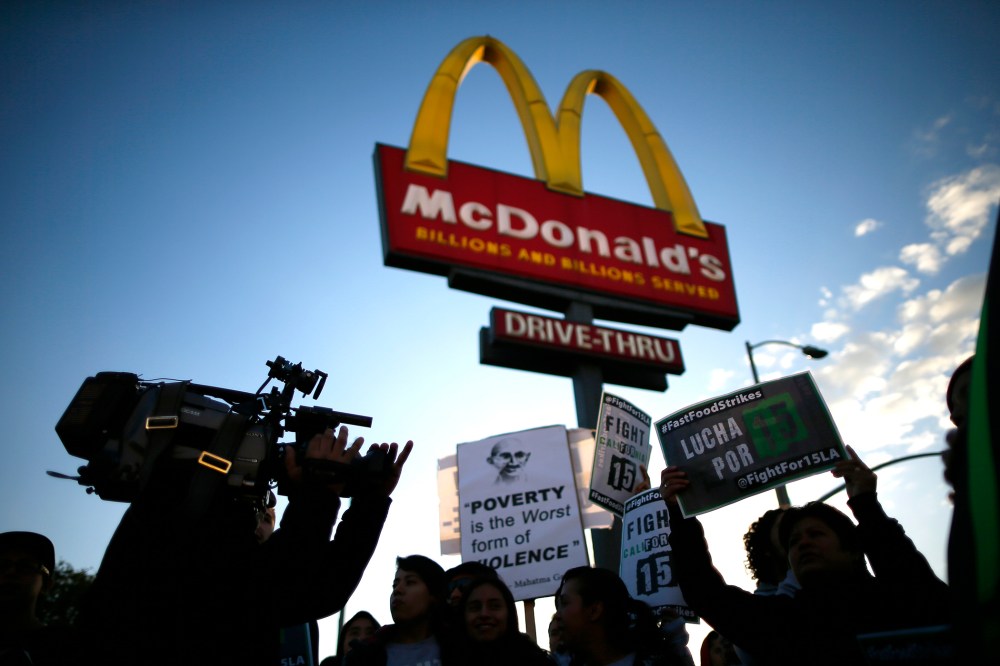 Protesters march outside McDonald's in Los Angeles