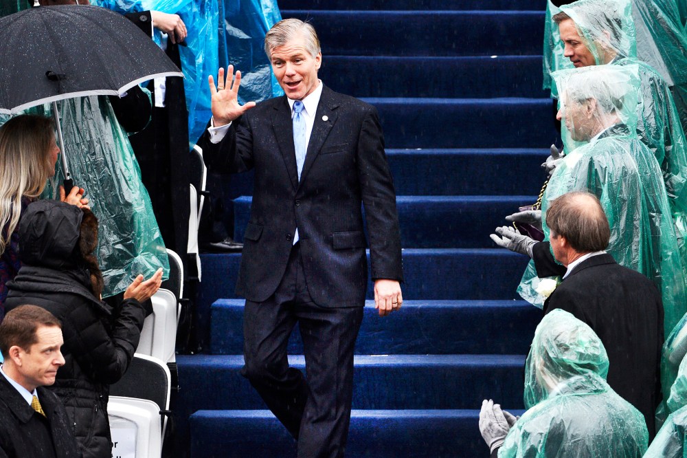Outgoing Virginia Governor McDonnell waves to guests as he arrives for the swearing-in ceremony of incoming governor McAuliffe in Richmond