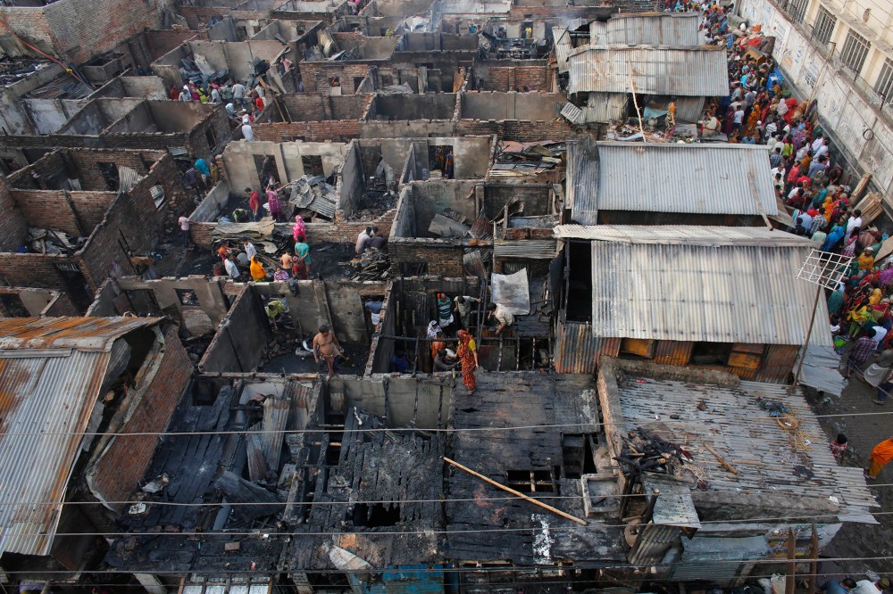 A general view of the wreckage of a slum from the top after a fire broke out, at Mirpur in Dhaka, Bangladesh on Feb. 11, 2014 (Photo by Andrew Biraj/Reuters).