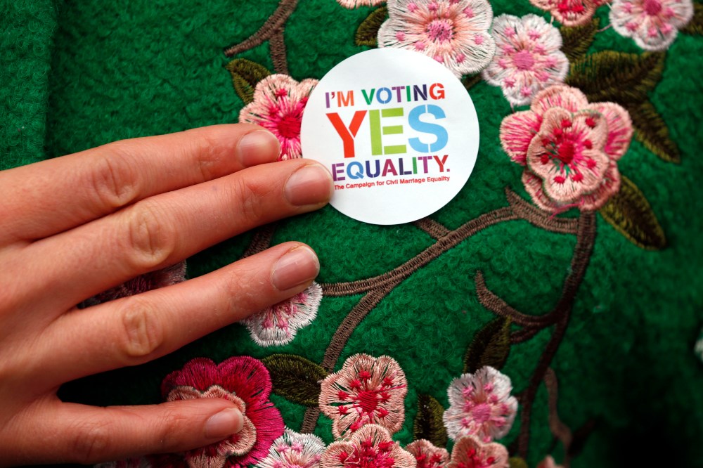 A Yes supporter shows her campaign badge in central Dublin, Ireland on May 21, 2015. (Photo by Cathal McNaughton/Reuters)