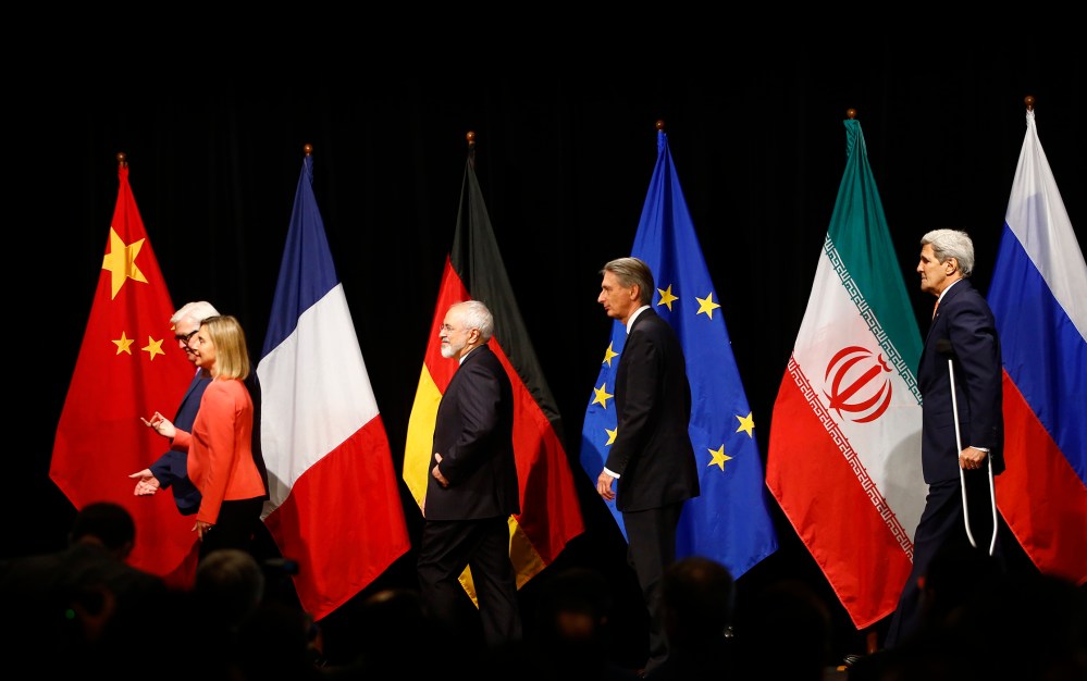 German, Iranian, British and American diplomats, Frank Walter Steinmeier, Federica Mogherini, Mohammad Javad Zarif, Philip Hammond and John Kerry (L-R) after the last plenary session in Vienna, Austria July 14, 2015. (Photo by Leonhard Foeger/Reuters)