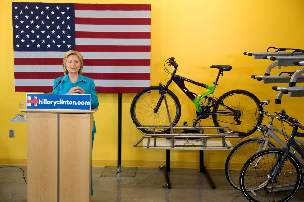 Democratic presidential hopeful Clinton talks about her environmental plan during a visit to the DART Central Station in Des Moines (Photo by Stringer/Reuters).