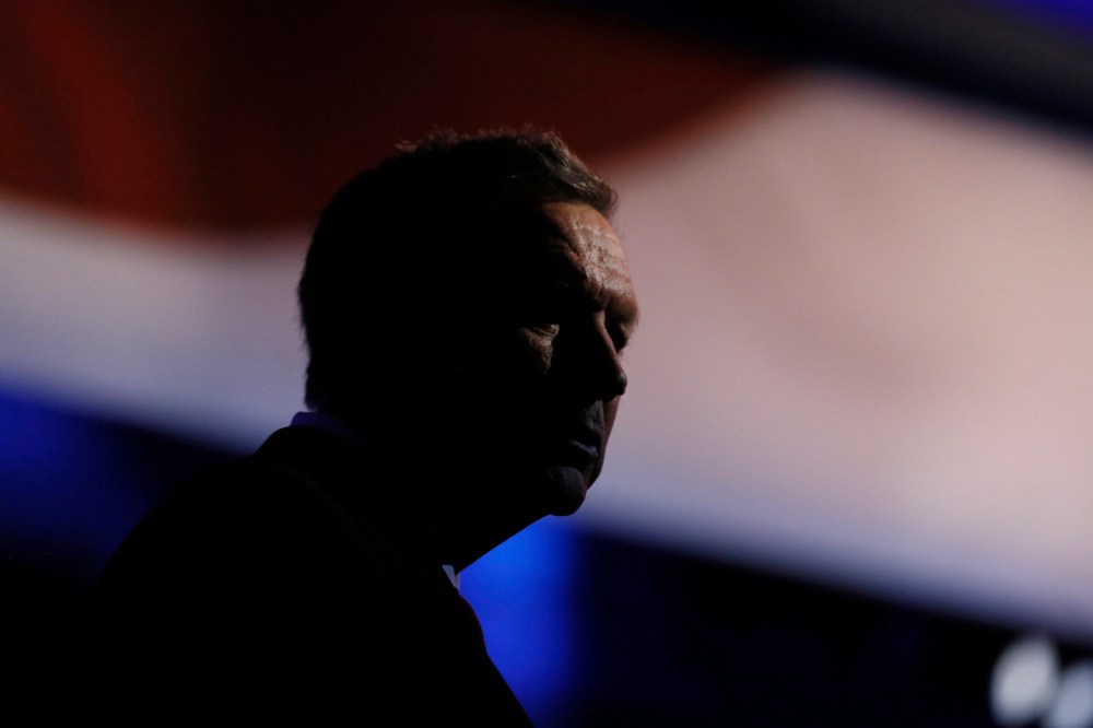 Republican U.S. presidential candidate and Ohio Governor John Kasich stands at his podium after the stage lights dimmed following the 2016 U.S. Republican presidential debate held by CNBC in Boulder, Colo., Oct. 28, 2015. (Photo by Rick Wilking/Reuters)