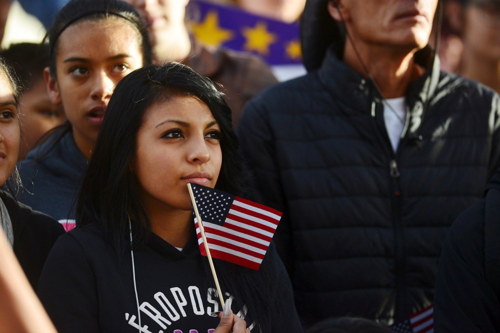 Latino leaders and immigration reform supporters gather outside the third Republican presidential debate held by CNBC in Boulder, Colo., Oct. 28, 2015. (Photo by Evan Semon/Reuters)