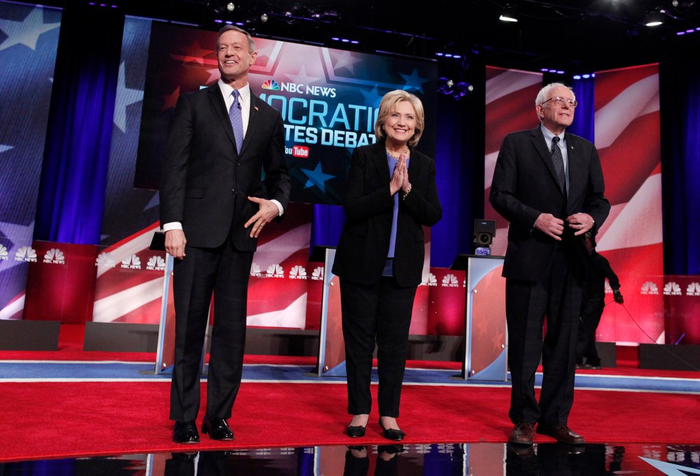 Democratic U.S. presidential candidates Martin O'Malley, Hillary Clinton and Senator Bernie Sanders pose together before the start of the NBC News - YouTube Democratic presidential candidates debate, Jan. 17, 2016. (Photo by Randall Hill/Reuters)