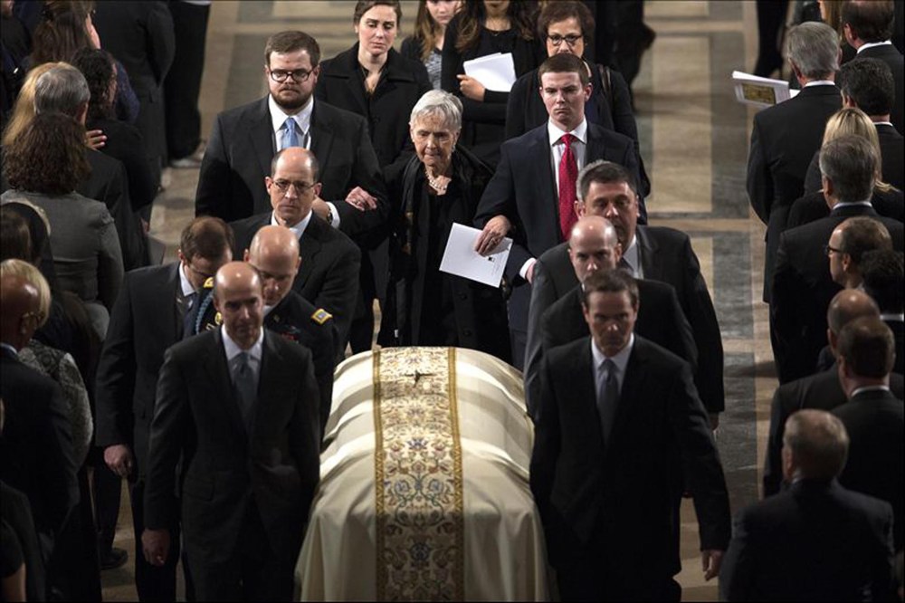 Supreme Court Justice Antonin Scalia's widow, Maureen McCarthy Scalia, walks behind the casket following his funeral Mass at the Basilica of the National Shrine of the Immaculate Conception in Washington, Feb. 20, 2016. (Photo by Doug Mills/Reuters)