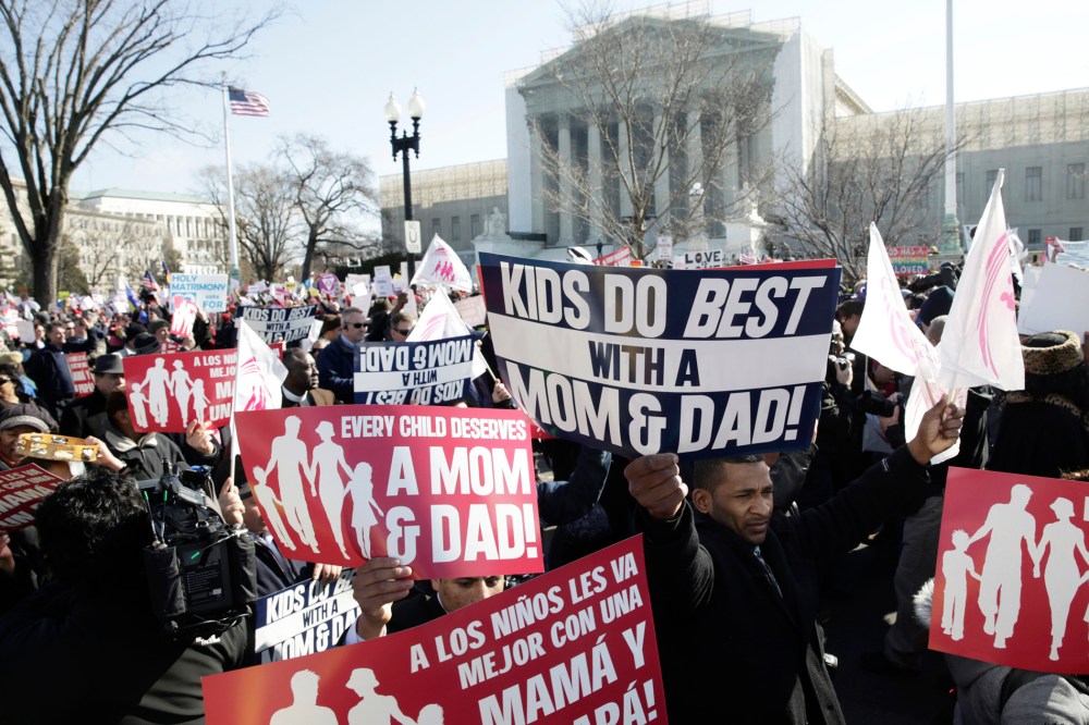 Opponents of same-sex marriage marriage demonstrate in front of the Supreme Court in Washington on March 26, 2013. (Photo by Joshua Roberts/Reuters)