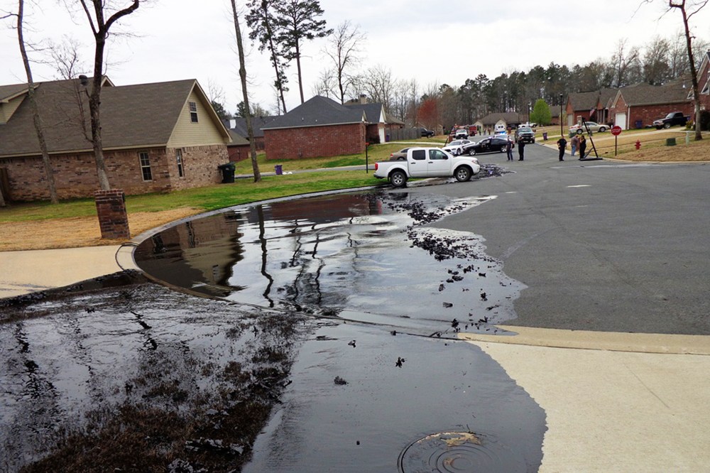 Spilt oil from Exxon pipeline run through North Woods Subdivision in Mayflower, Arkansas, March 29, 2013.