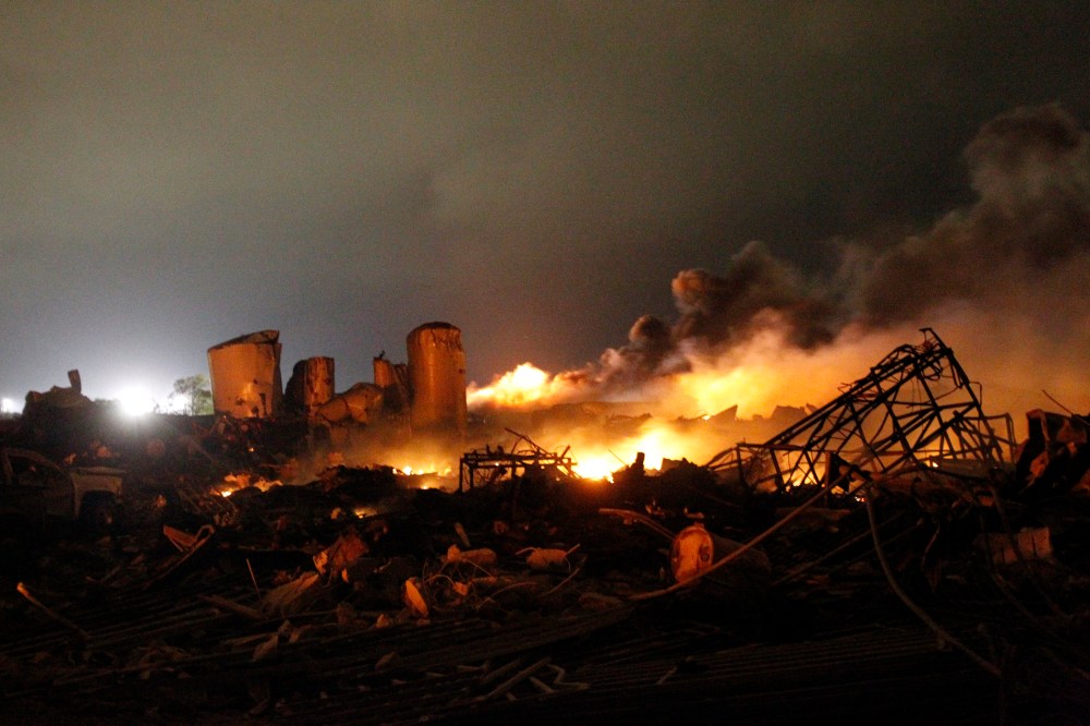 The remains of a fertilizer plant burn after an explosion at the plant in the town of West, near Waco, Texas early April 18, 2013.
