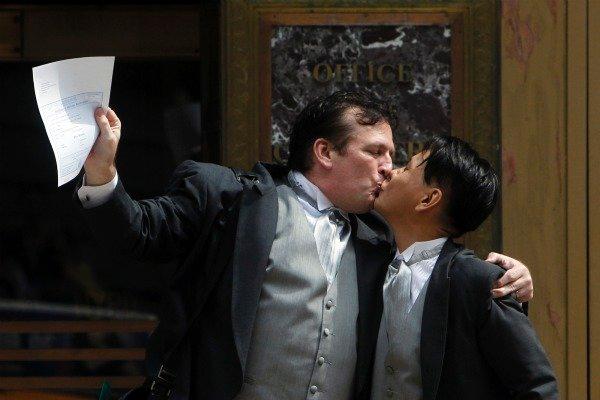 Patrick Plainand Seong Man Hong celebrate after getting married at the City Clerk's office in New York on Sunday.