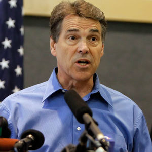 Gov. Rick Perry speaking at a press conference with state and local emergency personnel in Austin, Texas on Tuesday.