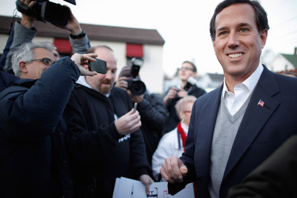 Rick Santorum (and his sweater vest) campaigning in Manchester, New Hampshire on Friday.