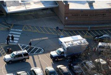 The scene outside of Sandy Hook Elementary School in Newtown, Conn., on Friday.