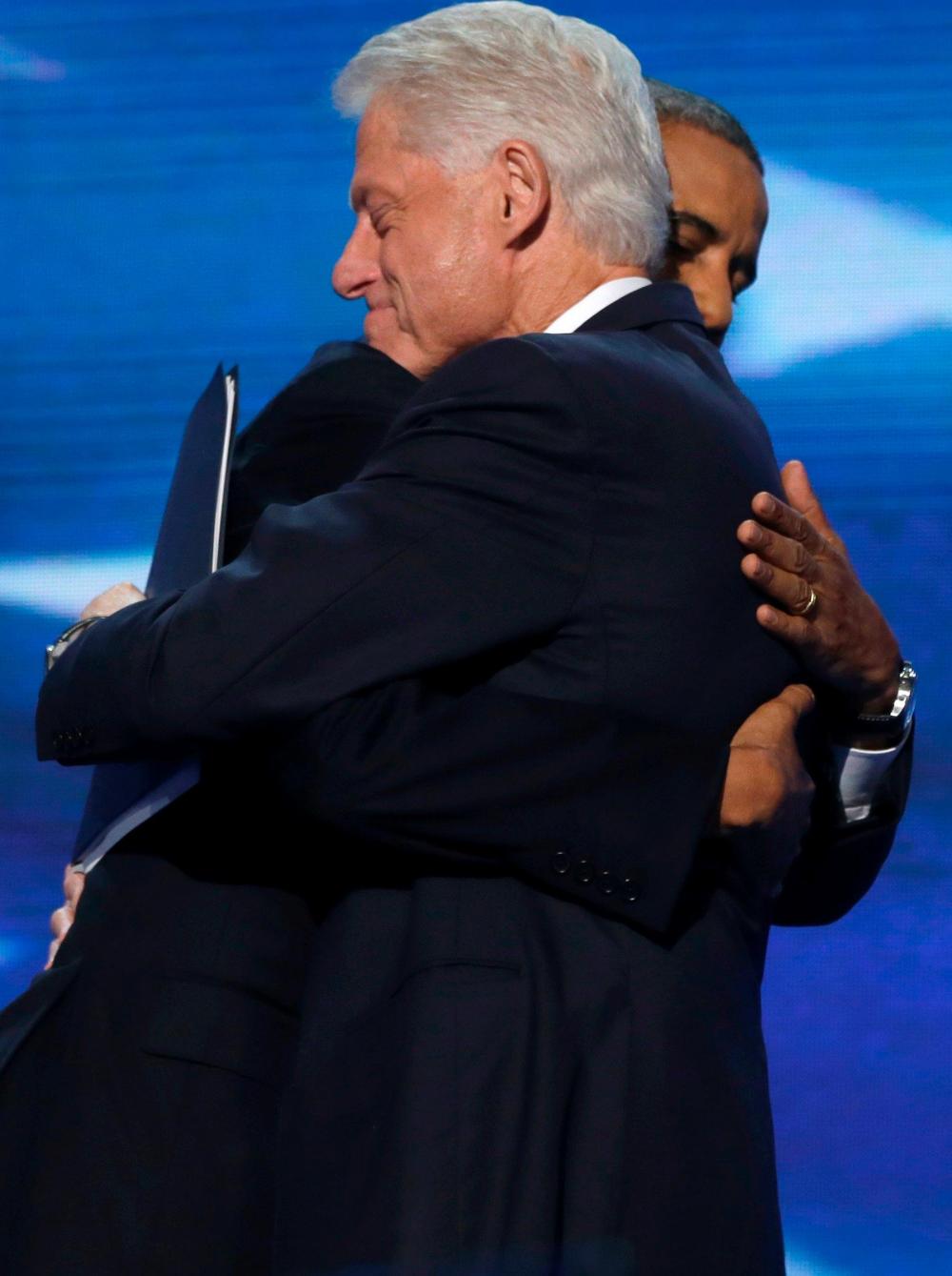 President Barack Obama hugs Former President Bill Clinton during the Democratic National Convention in Charlotte, N.C., on Wednesday, Sept. 5, 2012.