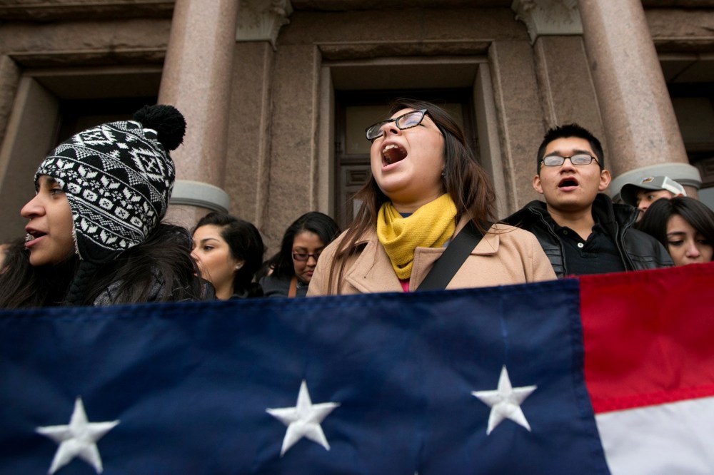 Maria Yolisma Garcia, 20, of Dallas rallies in support of the HB1403, the Texas DREAM Act, at a demonstration at the Capitol in Austin, Texas on Jan. 14, 2015. (Photo by Jay Janner/Austin American-Statesman/AP)