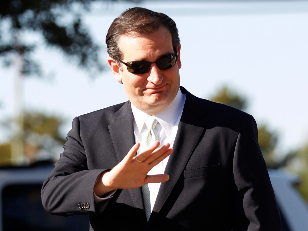 Republican candidate for U.S. Senate Ted Cruz waves as he arrives at a polling station to speak to media and voters in Dallas, Thursday, Nov. 1, 2012. (AP Photo/LM Otero)