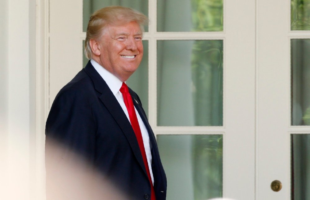 Image: U.S. President Trump arrives to announce decision to withdraw from Paris Climate Agreement in the White House Rose Garden in Washington