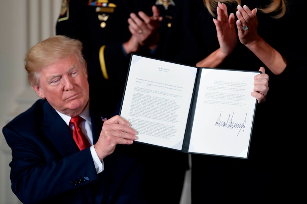 Image: US-HEALTH-DRUGS-TRUMP