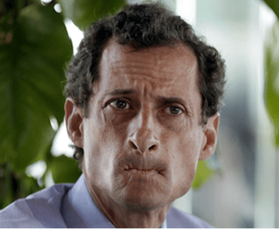 New York mayoral candidate Anthony Weiner listens to other candidates during a candidate forum on small business, in the Inwood section of the borough of Manhattan, in New York, Tuesday, July 30, 2013. (Photo by Richard Drew/AP)