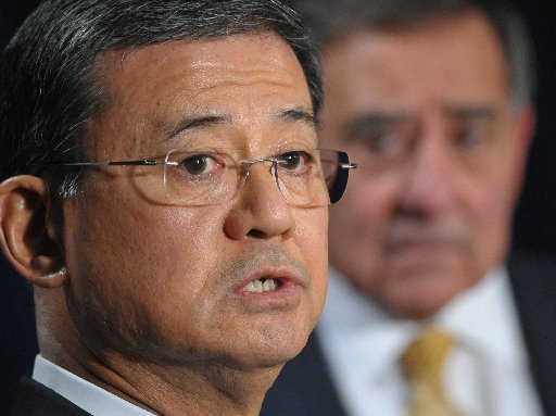 Veterans Affairs Secretary Eric Shinseki speaks to the media following a meeting with US Defense Secretary Leon Panetta (R) on February 5, 2013, at the Department of Veterans Affairs in Washington, DC. The two met to discuss increasing colloaboration...