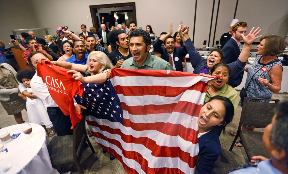 Immigration reform supporters crash the primary-night party of House Majority Leader Eric Cantor, R-Va., Tuesday, June 10, 2014.