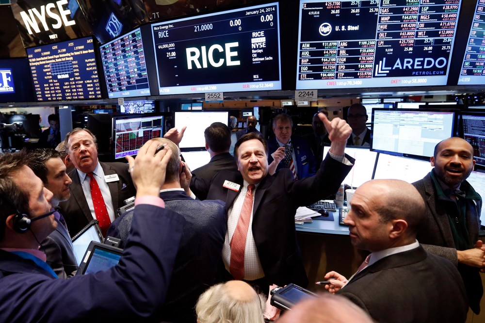 Traders work on the floor of the New York Stock Exchange Jan. 24, 2014.