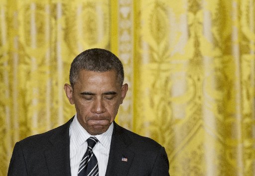 US President Barack Obama speaks during a LGBT (the lesbian, gay, bisexual, and transgender community) Pride Month celebration in the East Room of the White House in Washington, DC, on June 13, 2013. "We're reaching a turning point," he said. AFP PHOTO...