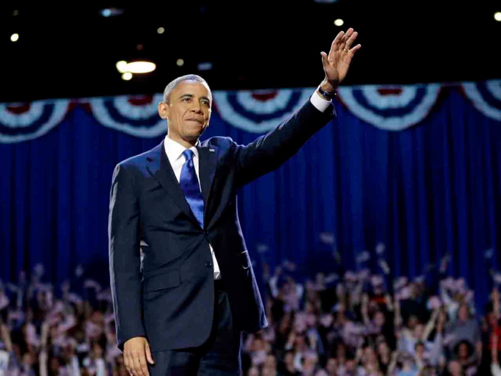 President Barack Obama waves during an election night party, Wednesday, Nov. 7, 2012, in Chicago. Obama defeated Republican challenger former Massachusetts Gov. Mitt Romney.(AP Photo/Matt Rourke)