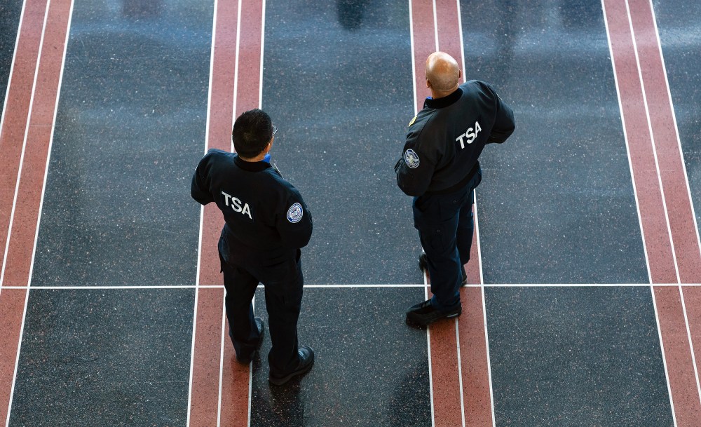 Transportation Security Administration (TSA) agents at Ronald Reagan Washington National Airport (DCA).