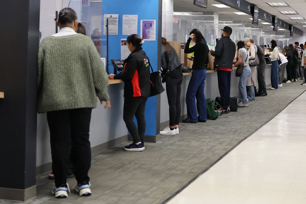 People line up at the New York State DMV in New York City.