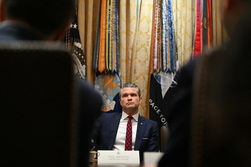 Secretary of Defense Pete Hegseth looks on during a Cabinet meeting hosted by President Donald Trump in the White House on Dec. 2, 2025.