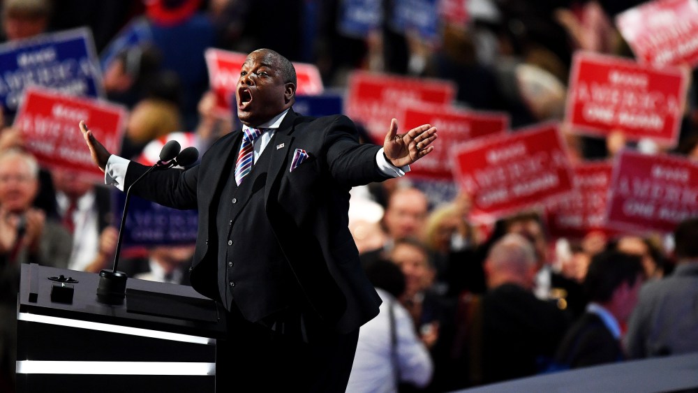 Pastor Mark Burns gestures as he delivers a speech at the Republican National Convention in Cleveland, O.H., on July 21, 2016.