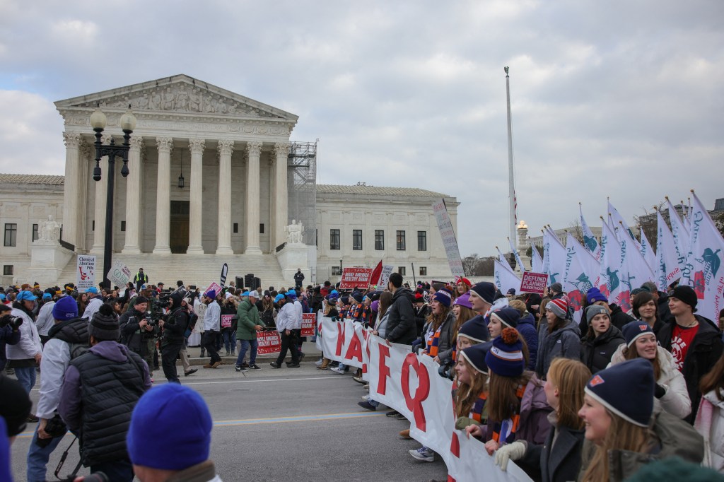 Anti-abortion rights demonstrators march to the Supreme Court for the 52nd annual March For Life in Washington, D.C.