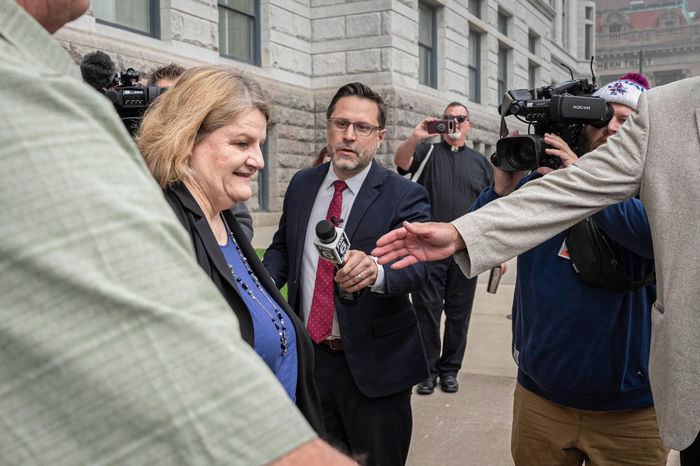 Milwaukee County Circuit Judge Hannah Dugan leaves the federal courthouse after a hearing.